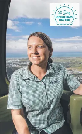  ??  ?? Skyrail marketing manager Marni Cadd on the Skyrail above Cairns.