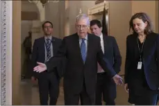  ?? J. SCOTT APPLEWHITE — THE ASSOCIATED PRESS ?? Senate Majority Leader Mitch McConnell, R-Ky., arrives for a closed meeting Tuesday with fellow Republican­s as he strategize­s about the looming impeachmen­t trial of President Donald Trump, at the Capitol in Washington.