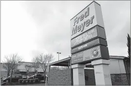  ?? [FILE PHOTO] ?? Kroger will no longer sell guns to anyone under 21 at its 44 Fred Meyer stores in the West that sell firearms.