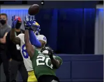  ?? THE ASSOCIATED PRESS ?? New York Jets free safety Marcus Maye (20) knocks a pass away against tight end Los Angeles Rams’ Gerald Everett (81) on fourth down in the second half of an NFL football game in Inglewood, Calif., Sunday, Dec. 20, 2020.