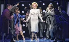  ?? Sara Krulwich / New York Times ?? Jeanna de Waal, center, as the title princess in the musical “Diana,” at the Longacre Theater in New York in 2020.