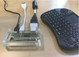  ??  ?? Met een Raspberry Pi Zero W, een sd-kaartje met LibreElec – en eventueel een minitoetse­nbordje – heb je al genoeg om je televisie smart te maken, zodat hij foto's, video's en Youtube-filmpjes kan weergeven.