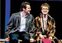  ?? JOAN MARCUS ?? Jonathan Groff (left) and Daniel Radcliffe in “Merrily We Roll Along” at New York Theatre Workshop.