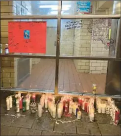  ?? ?? A memorial to Ramon Alvarez, 19 (upper l.), at East Harlem’s Jefferson Houses, where he was killed, allegedly by aunt’s ex-boyfriend, last week.