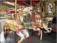  ?? DAVID S. GLASIER — THE NEWS-HERALD ?? Kessel Bros. carousel waits for riders during the 2017 Cuyahoga County Fair Aug. 7.