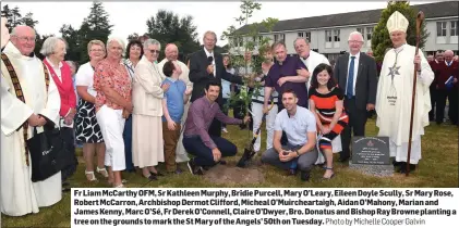 ?? Photo by Michelle Cooper Galvin ?? Fr Liam McCarthy OFM, Sr Kathleen Murphy, Bridie Purcell, Mary O’Leary, Eileen Doyle Scully, Sr Mary Rose, Robert McCarron, Archbishop Dermot Clifford, Micheal O’Muircheart­aigh, Aidan O’Mahony, Marian and James Kenny, Marc O’Sé, Fr Derek O’Connell, Claire O’Dwyer, Bro. Donatus and Bishop Ray Browne planting a tree on the grounds to mark the St Mary of the Angels’ 50th on Tuesday.
