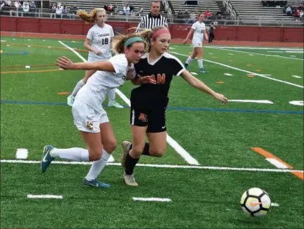  ?? RICK CAWLEY/FOR DIGITAL FIRST MEDIA ?? LC’s Emily Schall battles Ryan’s Kaitlin Brace for a loose ball Sunday.