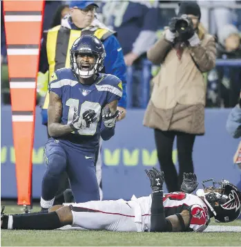  ?? OTTO GREULE JR. /GETTY IMAGES ?? Wide receiver Paul Richardson of the Seattle Seahawks reacts after having the pass broken up by cornerback Robert Alford of the Atlanta Falcons at CenturyLin­k Field on Monday in Seattle.
