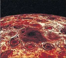  ?? [NASA] ?? This composite image, derived from data collected by the Jupiter-orbiting Juno spacecraft, shows a central cyclone at the planet’s north pole and the eight cyclones that encircle it.