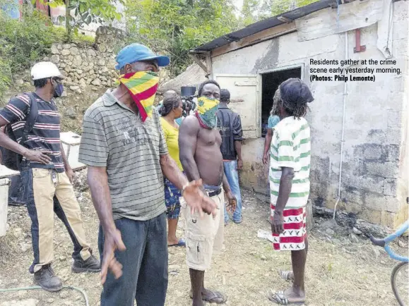  ?? (Photos: Philp Lemonte) ?? Residents gather at the crime scene early yesterday morning.