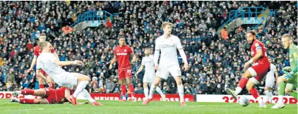  ??  ?? Crowd pleaser: Luke Ayling scores what proved to be the winner to calm Leeds United fans for a while at least