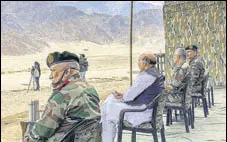  ?? PTI ?? Chief of Defence Staff Gen Bipin Rawat (left) with defence minister Rajnath Singh (centre) during their visit to Ladakh in July.