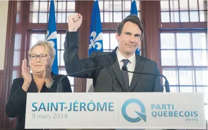  ?? GRAHAM HUGHES/ THE CANADIAN PRESS ?? Parti Quebecois leader Pauline Marois looks on as Pierre Karl Peladeau gestures during a press in Saint Jerome, Que., Sunday. He has been described by a Montreal columnist as ‘ one of the most prolific businessme­n of the last 20 years.’