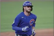  ?? TONY DEJAK - THE ASSOCIATED PRESS ?? FILE - Chicago Cubs’ Kris Bryant runs the bases after hitting a solo home run in the sixth inning during a baseball game against the Cleveland Indians in Cleveland, in this Wednesday, Aug. 12, 2020, file photo. Bryant is among roughly 125 players who entered Friday, Jan. 15, 2021, eligible to exchange salary arbitratio­n figures with their teams.