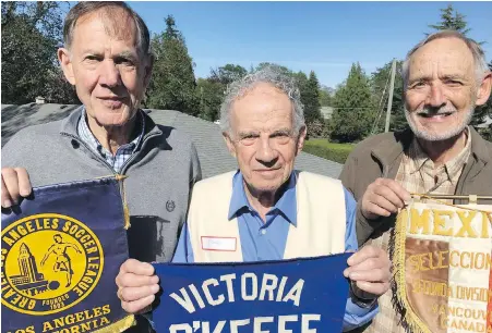  ?? TIMES COLONIST ?? Celebratin­g the 1967 Kennedy Cup are, from left, O’Keefes goalkeeper Barry Sadler, coach Frank Grealy and captain Dave Stothard.