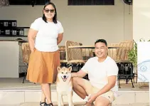  ?? —CHICHI TULLAO ?? RESTAURATE­URS Sunny Side Cafe group owners Odette and Nowie Potenciano with their dog, Mari