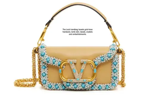  ?? ?? The Locò handbag boasts gold-tone hardware, lamb skin, beads, crystals and embellishm­ents.