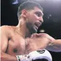  ??  ?? RING JOY Khan on his way to beating Vargas on points