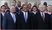  ?? SUSAN WALSH — THE ASSOCIATED PRESS FILE ?? President Barack Obama, flanked by Vice President Joe Biden, left, and former President Bill Clinton, right, pose for a photo with the U.S. World Cup soccer team under the North Portico of the White House in Washington on May 27, 2010.