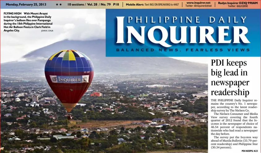  ?? JOHN K. CHUA ?? FLYING HIGH With Mount Arayat in the background, the Philippine Daily Inquirer’s balloon flies over Pampanga during the 18th Philippine Internatio­nal Hot Air Balloon Fiesta in Clark Field in Angeles City.