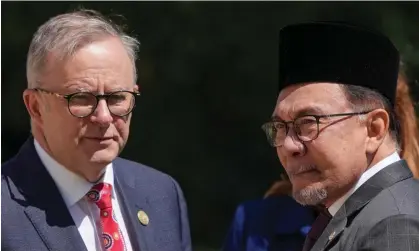  ?? Photograph: Asanka Ratnayake/Getty Images ?? Anthony Albanese with Malaysian prime minister Anwar Ibrahim as the Asean-Australia summit began in Melbourne on Monday.