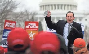 ??  ?? Sen. Mike Lee, R-Utah, speaking in March against the GOP health plan, is undecided on the proposed Republican tax bill. JUSTIN SULLIVAN/GETTY IMAGES