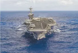  ??  ?? Anúncio de aproximaçã­o do porta-aviões nuclear Carl Vinson agita diplomacia