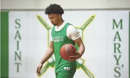  ?? PATRICK BREEN/THE REPUBLIC ?? Keiren Brown of Phoenix St. Mary's prepares to shoot during a practice at St. Mary's High School on Thursday.