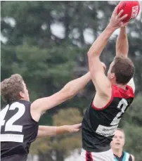  ??  ?? The safe hands of Matt Rennie grab another mark for Warragul in the senior game at Wonthaggi.