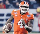  ?? RICK SCUTERI/ASSOCIATED PRESS ?? Quarterbac­k Deshaun Watson said he came to Clemson because he believed the program was on the upswing and would play in big games.