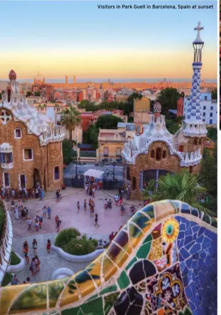  ??  ?? Visitors in Park Guell in Barcelona, Spain at sunset