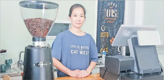  ?? Picture: JONA KONATACI ?? Susan Chen at her coffee shop, Lava Cafe, along Joske St in Suva.