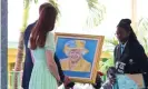  ?? Photograph: Ian Vogler/The Daily Mirror/PA ?? The Duke and Duchess of Cambridge view a portrait of the Queen during a visit to Sybil Strachan primary school in Nassau, the Bahamas.