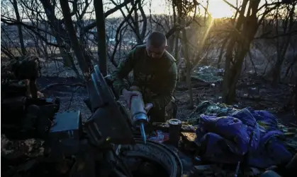  ?? ?? A Ukrainian serviceman loads shells in a tank in the Luhansk region on Sunday. Photograph: Reuters