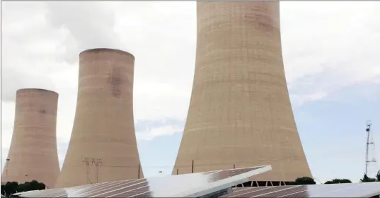  ??  ?? The cooling towers at Eskom’s coal-powered Lethabo power station near Sasolburg. South Africa’s green energy drive was the world’s fastest, but it is now at risk as the president pushes for nuclear and Eskom refuses to sign power-purchase agreements...
