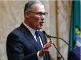  ?? Elaine Thompson / Associated Press ?? Washington Gov. Jay Inslee is joining legislatur­es across the nation in efforts to restore net neutrality rules.