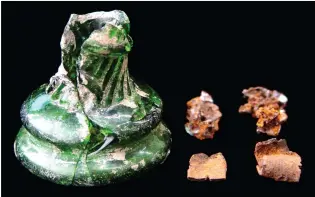  ??  ?? Left: 19th-century glass, possibly a candlestic­k base, found during building work in Lincolnshi­re and holding corroded iron and copperallo­y objects (possibly pins and dress hooks) and a leather strap (bottle base 5cm across); the oldest use of the term “witch bottle” the project has found is 1844, when the practice may have changed from its 17th-century origins