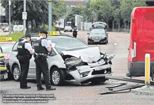  ?? PHOTOPRESS ?? A road crash involving two taxis and a van caused severe traffic disruption at the Millfield and Peter’s Hill junction in Belfast yesterday