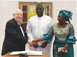  ?? (Mark Neyman/GPO) ?? PRESIDENT REUVEN RIVLIN meets with new Nigerian Ambassador to Israel Nart Augustine Kolo and his wife at President’s Residence yesterday.