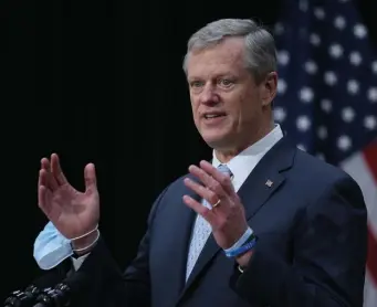  ?? NANCy lANE / hErAld sTAFF FIlE ?? ‘PART OF THE LUMPINESS’: Gov. Charlie Baker said he’s frustrated that the state will now receive fewer vaccinatio­n doses in the first distributi­on wave than was originally projected.