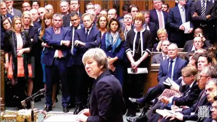  ?? PRU/AFP ?? Britain’s Prime Minister Theresa May makes a statement in the House of Commons in London on Monday. May faced a no-confidence vote on Wednesday in the wake of her desperate decision to delay a vote on Brexit.