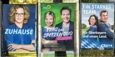  ?? Foto: dpa/Matthias Balk/SPD/Grüne/CSU ?? Plakate der Spitzenkan­didaten von SPD, Grünen und CSU zur Landtagswa­hl in Bayern (v.l.n.r.)