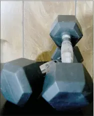  ?? Keith Bryant/The Weekly Vista ?? Home exercise equipment, like these dumbbells, is not necessary but can be helpful to build a fitness routine during quarantine.