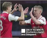  ?? ?? ■ ZIN IT TO WIN IT: Zinchenko (right) and Odegaard