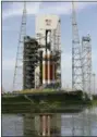  ?? JOHN RAOUX — THE ASSOCIATED PRESS ?? The tower structure for a Delta IV rocket rolls back for launch at complex 37 at the Kennedy Space Center, Friday, Aug. 10, 2018, in Cape Canaveral, Fla.