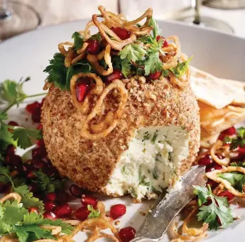  ?? DAVID DE STEFANO ?? Ricardo’s Pecan and Jalapeno Cheese Ball combines sharp cheddar cheese with chopped pecans and fried shallots.