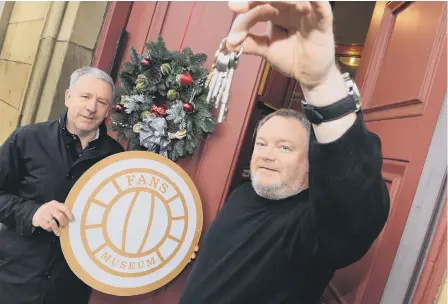  ??  ?? SAFC Fans’ Museum founder Michael Ganley has been formally handed the keys, with museum ambassador Sunderland SAFC legend Kevin Ball.