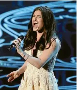  ?? REUTERS ?? Idina Menzel belts out the hit song from Frozen, Let It Go, at the Oscars in 2014.