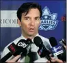  ??  ?? Dallas Eakins, coach of the Toronto Marlies, talks to the media about his new appointmen­t in Toronto in August.