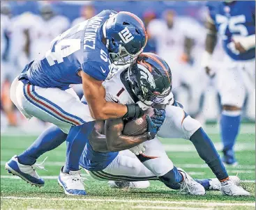  ?? AP ?? INSIDER TIPS: Blake Martinez, whose season was ended in Week 3 by a torn anterior cruciate ligament, has been working a tutor for the Giants’ inside linebacker­s.